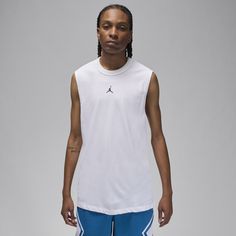 Designed to help you perform to your full extent on the court, this sleeveless top uses our sweat-wicking technology to help you stay fresh and focused through even the most grueling of games. Its classic fit gives you just the right amount of room while hem vents help you make big moves with ease. White Crew Neck Tank Top Athleisure, White Crew Neck Tank Top For Athleisure, White Athleisure Tank Top For Streetwear, White Sportswear Tank Top For Streetwear, White Moisture-wicking Basketball Top, White Moisture-wicking Tank Top, Moisture-wicking Crew Neck Basketball Top, White Tank Muscle Tee For Sports, White Sporty Muscle Tank Tee