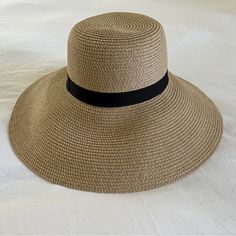 Nwot Wide Brim Classic Brown Bucket Hat For Summer, Classic Brown Sun Hat For The Beach, Classic Brown Sun Hat For Beach, Classic Brown Sun Hat For Vacation, Classic Brown Boater Hat For Beach, Classic Brown Bucket Sun Hat, Brown Lightweight Wide Brim Straw Hat, Lightweight Brown Wide Brim Straw Hat, Brown Lightweight Straw Hat With Wide Brim