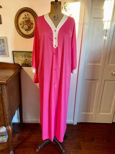 Incredible pink ombré kaftan. Totally reminds me of Mrs Roper from Three's Company. Size large--will easily fit up to a modern day 12. In excellent vintage condition expect for some yellowing around the color. Makeup stains maybe? Ankle length. Pink V-neck Maxi Dress For Loungewear, Pink V-neck Nightgown For Home, Vintage Pink Robe For Loungewear, Pink Bohemian Maxi Dress For Loungewear, Long Pink Summer Sleepwear, Bohemian Pink Sleepwear For Loungewear, Pink Bohemian Sleepwear For Loungewear, Long-sleeved Pink Vintage Robe, Spring Pink Kaftan For Loungewear