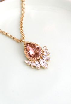 "Blush Necklace, Morganite Necklace, Bridal Necklace, Rose Gold Necklace, Blush Crystal Necklace, Bridesmaids Swarovski Crystal Necklaces Matching jewelry : http://etsy.me/2FOtx9O Petite Delights is an Official SWAROVSKI® Branding Partner Our brand is legally licensed & authorized By Swarovski Company for high quality manufacturing. Details : ♥ Materials- Gold Plated Over Brass, The necklace is 14 k Gold Filled CRYSTALLIZED™ Swarovski Element. ♥ Choose your style of plating at checkout ♥ U.S Pink Teardrop Pendant Jewelry For Wedding, Delicate Pink Necklace For Bridesmaid Gift, Elegant Pink Drop Necklace For Gift, Wedding Necklace With Teardrop Pendant And Jewels, Elegant Pink Necklace With Jewels, Elegant Pink Jeweled Necklaces, Feminine Rose Gold Wedding Necklaces, Feminine Rose Gold Necklaces For Weddings, Feminine Rose Gold Party Necklaces