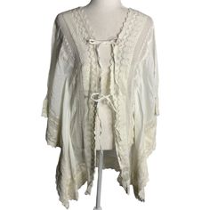 Downeast Riviera Retreat Cover Up Xs/S White Kaftan Crochet Lace Tie Front New New With Tags Chest: 16" Laying Flat Sleeves: 11" Length: 32" Shoulder To Hem 100% Cotton Made In India Summer Beach Blouse With Open Front, Cotton Wrap Blouse For Beach, Fitted Bohemian Cover-up With Lace Trim, Bohemian Open Front Tops For Brunch, Bohemian Daywear Cover-up With Open Front, Bohemian Open Front Daywear Cover-up, Beach Lace Blouse, Fitted Bohemian Cover-up For Brunch, Bohemian Fitted Brunch Cover-up