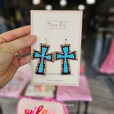 These charming earrings feature a cross design filled with turquoise tone beads, accented around the edges with multicolor beads. They’re as distinctive as they are stylish, and the perfect addition to your jewelry collection. Beaded Cross Earrings, Beaded Cross, Cross Design, Cross Earrings, Cross Designs, A Cross, Beaded Earrings, Jewelry Collection, Turquoise