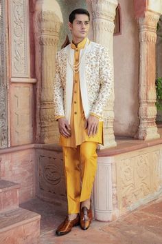 Cream jacket style bandhgala with beige floral embroidery, hints of yellow floral vines, aari, dabka and beadwork highlights. Comes with yellow broad pintucked border, front open kurta and pant. - Aza Fashions Cream Jacket, Kurta With Pants, Floral Vine, Pants Pattern, Pin Tucks, Raw Silk, Yellow Floral, Aza Fashion, Jacket Style