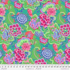 a green and pink floral print fabric