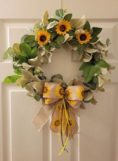 Decorate your door or window with this natural-looking 18" artificial Foliage Wreath with sunflowers. Suitable for Everyday decoration, as well as Spring, Summer and Easter. This greenery wreath does not need any maintenance to keep the fresh look long-lasting.