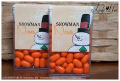 two bags of candy with snowman on them