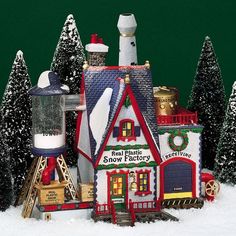 there is a toy house in the snow