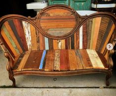 a bench made out of old wooden boards