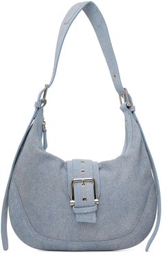 Suede shoulder bag in blue. · Trompe-l'œil graphic throughout · Adjustable and detachable padded shoulder strap · Pin-buckle detailing at magnetic tab · Zip closure · Patch pockets at interior · Faux-suede lining · Logo-engraved silver-tone hardware · H11 x W13.5 x D0.5 Supplier color: New denim sky Blue Satchel With Palladium Hardware, Blue Shoulder Bag With Metal Hardware For Travel, Blue Shoulder Bag With Metal Hardware For Everyday Use, Modern Blue Hobo Bag With Adjustable Strap, Blue Satchel Shoulder Bag With Palladium Hardware, Everyday Blue Shoulder Bag With Metal Hardware, Blue Satchel Shoulder Bag With Metal Hardware, Blue Double Handle Bag With Metal Hardware, Casual Denim Blue Shoulder Bag For On-the-go