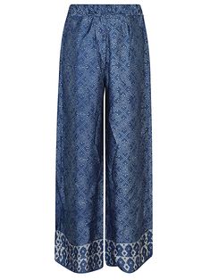 Wide leg trousers, with ethnic print, elastic waist and two side welt pockets. This item is in size M and the color is Blue Silk Trousers, Ethnic Print, Printed Silk, Blue Pants, Wide Leg Trousers, Welt Pockets, Silk Printing, Welt Pocket, Trousers Women