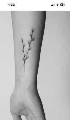 a woman's foot with a small flower tattoo on her left side calfocks