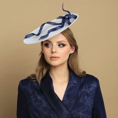 Hand blocked creamy and navy blue saucer hat from high quality sinamy (3 sheets) using traditional millinery techniques. This cocktail hat is accented with hand made navy blue sinamay.  Iis attached to silver metal headband. You can write to me for more informations. Ready to shipped in 4-7 working days. If You want to change something please write to me. I can personalized Your order (the price can be different). RETURNS AND EXCHANGE DETAIL Returns must be made within 14 days (date on the post Elegant White Brimmed Felt Hat, White Wide Brim Felt Hat For Formal Occasions, Elegant Felt Hat For Kentucky Derby, Elegant Cream Felt Hat For Summer, Elegant Formal Felt Hat, Elegant Evening Felt Hat For Spring, Navy Formal Hat With Curved Brim, Elegant Wide Brim Felt Hat For Party, Navy Curved Brim Formal Hat