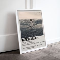 there is a poster on the floor in front of a door that says intersteular