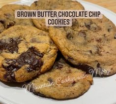 brown butter chocolate chip cookies on a white plate with text overlaying the image