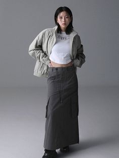 This is a sturdy yet lightweight pair of pants made from cotton nylon fabric. It has an easy size adjustment with waist drawstring.- Dimensional side flap pocket for practicality- Front ZENDUST 3M print for a distinctive look- Bottom drawstring for versatile styling options Khaki Cotton Cargo Skirt With Multiple Pockets, Khaki Cotton Cargo Skirt, Khaki Cotton Cargo Skirt With Side Pockets, Cotton Cargo Skirt With Drawstring For Spring, Casual Cotton Cargo Skirt With Elastic Waistband, Spring Cotton Cargo Skirt With Drawstring, Baggy Cotton Cargo Skirt With Pockets, Casual Khaki Cargo Skirt With Side Pockets, Baggy Cotton Cargo Skirt