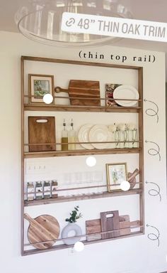 there are many items on the shelves in this room that is labeled thin top rail