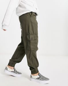 Cargo pants by JJXX Cart-worthy find High rise Stretch-back waistband Functional pockets Elastic cuffs Relaxed, tapered fit Relaxed Fit Cargo Pants With Cuffed Ankles, Cargo Pants With Cuffed Ankles And Pockets, Utility Pants With Cuffed Ankles And Pockets, Streetwear Bottoms With Pockets And Cuffed Ankles, Cuffed Cargo Pants, Trouser Fashion, Green Cargos, Denim Cargo Pants, Baggy Cargo Pants