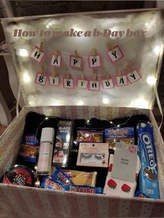 a birthday gift box filled with lots of goodies