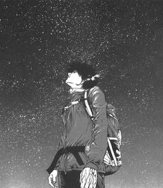 a person with a backpack looking up at the stars