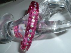 Rhinestone Bangle For Party, Adjustable Bangle With Sparkling Stones, Adjustable Bangle With Sparkling Stones Gift, Bling Bangle Bracelet For Gifts, Pink Rhinestone Bangle Bracelet, Pink Rhinestone Bangle Bracelets, Crystal Bangle Bracelet With Rhinestones For Gift, Pink Rhinestone Party Bracelets, Pink Crystal Bangle For Party