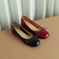 Check out our black ballet flats with a bow. They're perfect for any occasion. whether you're headed to the office or a night out on the town. Made of high-quality patent leather. they're sure to last you season after season. And they go great with just about anything in your wardrobe - from jeans to dresses. So why wait? Get your pair today! Upper: Patent Leather Lining: Leather Outsole: TPR Toe: Round Toe Closure: Slip on Color: Burgundy. Black is_handmade: Yes Black Ballet Flats For Office Wear In Fall, Patent Leather Ballet Flats With Bow, Patent Leather Bow Flats, Chic Patent Leather Ballet Flats For Party, Classic Black Patent Leather Ballet Flats, Patent Leather Ballet Flats For Office, Black Patent Leather Closed Toe Ballet Flats, Black Ballet Flats With Bow For Formal Occasions, Formal Black Ballet Flats With Bow