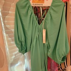 Size Medium Teal/Green Color Bottom Is Lined Green Blouse For Spring Day Out, Spring Green Flowy Blouse, Chic Green Spring Blouse, Spring Green Blouse, Chic Green Blouse For Vacation, Chic Green Blouse For Spring, Green Evening Tops For Spring, Spring Party Blouse With Flowy Fit, Spring Party Flowy Blouse