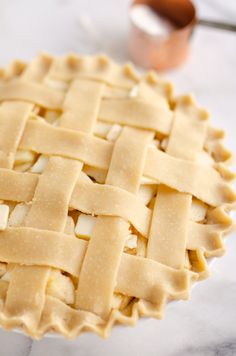 an uncooked pie sitting on top of a table