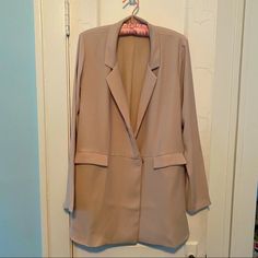 Beautiful And Stylish Zara Women’s Long Beige Blazer Jacket - Medium Brand New Without Tags. Never Worn. Two Snap Buttons Front Closure Two Front Pockets Does Have One Small Dot Near Pocket (Please See Picture) May Come Out With Cleaning Size Medium Length: 33” Pit To Pit: 21” Arm Inseam: 18” Long Sleeve Neutral Blazer For Fall, Neutral Long Sleeve Blazer For Fall, Notch Lapel Outerwear With Pockets For Day Out, Neutral Blazer For Spring Day Out, Spring Neutral Blazer For Day Out, Neutral Blazer For Day Out In Spring, Zara Long Sleeve Outerwear For Office, Zara Neutral Blazer For Fall, Zara Long Sleeve Office Outerwear