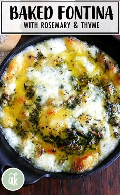 an iron skillet filled with cheese and broccoli on top of a wooden table