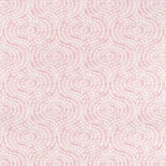 a pink and white background with circles