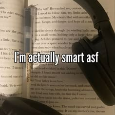 an open book with headphones on it and the words i'm actually smart asf