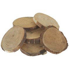 several pieces of wood stacked on top of each other in the shape of circles, isolated against a white background