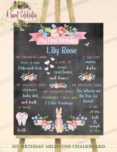 a chalkboard sign that says, my first birthday lily rose