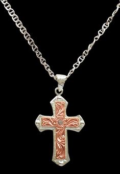 Silver & Copper Western Cross Necklace with Engraving Details: Silver and copper cross pendant with engraved accents and clear stone 18" silver tone chain Pendant measures approximately 1 7/8" X 1 1/4" Lead & nickel free Western Cross Necklace, Western Candle Holders, Western Picture Frames, Western Sculpture, Western Rings, Western Bracelets, Western Prints, Western Cross, Western Necklaces