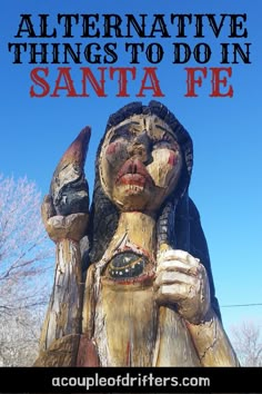 a wooden statue with text overlay that reads alternative things to do in santa fe