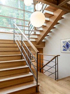 the stairs are made of wood and metal