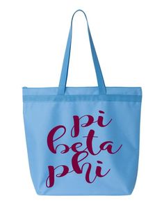 a blue tote bag with the words pi peta pi in red on it