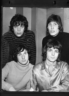 the rolling stones pose for a portrait in their dressing room