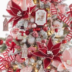 a christmas tree decorated with red and white ornaments