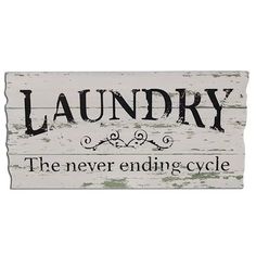 a sign that says laundry the never ending cycle on it's white wooden frame