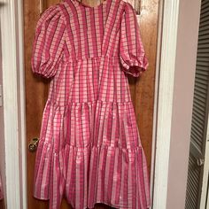 Never Been Worn With Tags. Fun Vacation Or Spring Dress! Size: 40 (Roughly Us 10) Oversized Fit Puffed Sleeves, Pink Slip Dress, And Bow On Back. Pink Cotton Puff Sleeve Midi Dress, Pink Puff Sleeve Cotton Midi Dress, Plaid Puff Sleeve Dress With Ruffles, Pink Puff Sleeve Midi Dress With Ruffle Hem, Pink Smock Midi Dress For Daywear, Pink Slip Dress, Pink Ruffle Dress, Pink Ruffle, Spring Dress