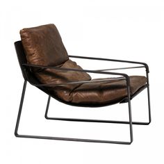 a brown leather chair sitting on top of a metal frame