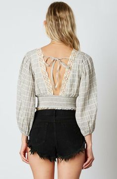 Final Sale - Get it before it's gone! What's not to love about the Lola Beige and Black Striped Lace Crop Top! Lightweight rayon, in a black and natural striped print, shapes a crochet trimmed deep V-neckline and three-quarter length peasant sleeves. A smocked band cinches the cropped hem. V-back with crochet trim and tie. DETAILS & CARE Cotton. Machine wash cold. Imported. White Lace Crop Top, Black Lace Crop Top, Peasant Sleeve, Puff Sleeve Crop Top, Beige And Black, Cute Crop Tops, Pink Boho, Lace Crop Tops, Crochet Trim