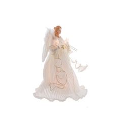 an angel figurine holding a bouquet of flowers