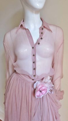 For Sale on 1stDibs - A gorgeous set from Dolce & Gabbana consisting of a shirt and skirt made of pale pink sheer silk . The long sleeve shirt style top has a small collar and Shirt Style Tops, Shirt And Skirt, Pink Sheer, Silk Skirt, Pink Silk, Pale Pink, Long Sleeve Shirt, Tulle Skirt, Shirt Style