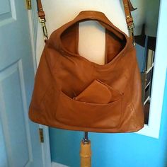 This Gorgeous Bag Features Buttery Honey-Colored Leather, A Detachable Shoulder Strap, And A Matching Wallet! Interior Has Two Small Slip Pockets On One Side And One Large Zippered Pocket On The Other. Zip Top Closure On The Bag Itself. Magnetic Closure On Wallet. New With Tags. Retail Price: $248. There Is One Minor Scuff On The Base (See Pics) But Otherwise This Bag Is Flawless! Chic Leather Hobo Bag With Cell Phone Pocket, Leather Bag With Cell Phone Pocket For Errands, Leather Hobo Tote Bag With Cell Phone Pocket, Hobo Satchel Bag With Cell Phone Pocket For Errands, Rectangular Leather Hobo Bag With Pockets, Leather Hobo Bag With Pockets For On-the-go, Brown Leather Hobo Bag With Pockets, Soft Leather Clutch Hobo Bag For Everyday Use, Leather Hobo Bag With Pockets For Errands