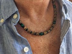 Men's surf necklace in extra wide 8mm, is. a Hawaiian style necklace, in emerald green genuine jade stones plus black bone and waxed brown coconut. GREAT QUALITY: Hand beaded on durable, 49 strand coated stainless steel beading wire. Secure screw in clasp or lobster clasp... Your choice! TO SEE MORE MENS CROSS NECKLACE IDEAS click here. https://www.etsy.com/shop/JTMauiDesigns?ref=seller-platform-mcnav§ion_id=18505639 All designs may be modified and ordered with or without cross. Just ask the art Green Jade Necklace, Bohemian Style Men, Surf Necklace, Mens Beaded Necklaces, Jade Bead Necklace, Mens Cross Necklace, Necklaces For Men, Necklace Ideas, Beads Bracelet Design