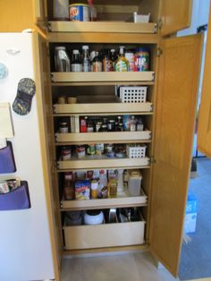 a kitchen pantry with lots of food in it