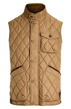 "Find RALPH LAUREN Beaton Quilted Vest on Editorialist. The between-season looks far more polished with a low-profile quilted vest popped with plenty of pocket space and shaped with snapped tabs at the waist. 27 1/2\" length (size Medium) Front zip closure with snap storm placket Stand collar Chest button-flap patch pocket; front patch pocket Adjustable snap side tabs Lined, with 96% recycled polyester, 4% polyester fill 100% recycled polyester Machine wash, tumble dry Imported" Polo Vest, Honey Brown, Quilted Vest, Stand Collar, Low Profile, Patch Pocket, Polo Ralph, Polo Ralph Lauren, Ralph Lauren