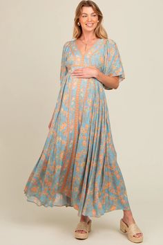 Blue Floral Border Print Flutter Sleeve Maternity Maxi Dress – PinkBlush Blue Flowy Empire Waist Maxi Dress, Flowy Blue Maxi Dress With Empire Waist, Blue Flowy Maxi Dress With Empire Waist, Flowy Printed Dress With Short Sleeves, Billowy Empire Waist Spring Dress, Flowy Printed Rayon Dresses, Billowy Short Sleeve Beach Dress, Blue Printed Dress With Relaxed Fit, Flowy Bohemian Midi Dress With Flutter Sleeves